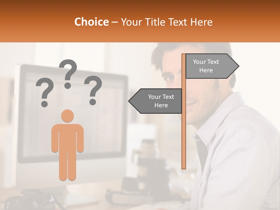 A Man Sitting At A Desk In Front Of A Computer PowerPoint Template