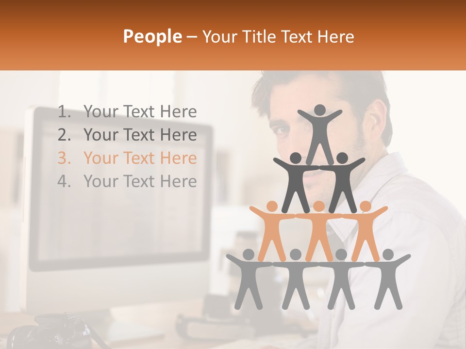 A Man Sitting At A Desk In Front Of A Computer PowerPoint Template