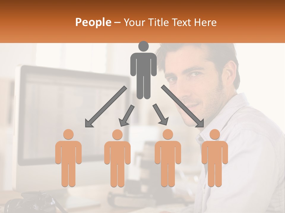 A Man Sitting At A Desk In Front Of A Computer PowerPoint Template