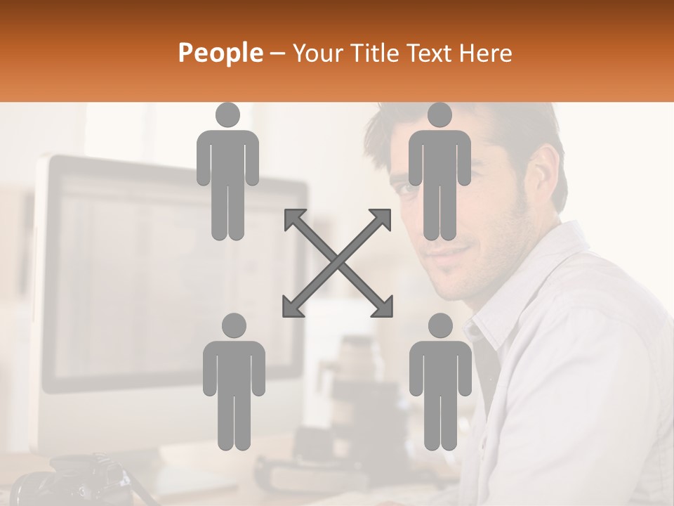 A Man Sitting At A Desk In Front Of A Computer PowerPoint Template