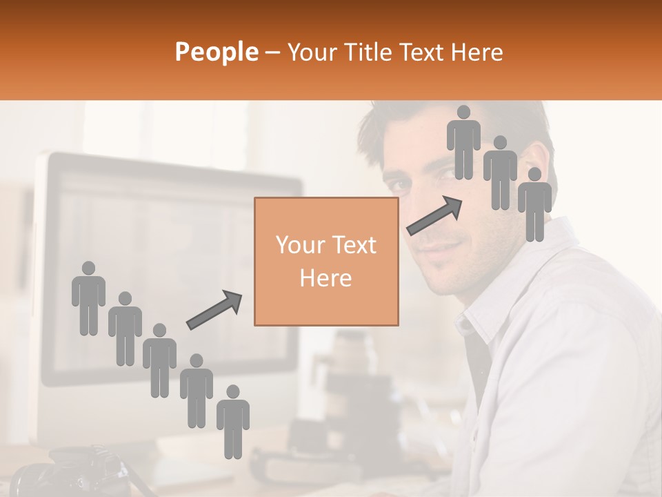 A Man Sitting At A Desk In Front Of A Computer PowerPoint Template