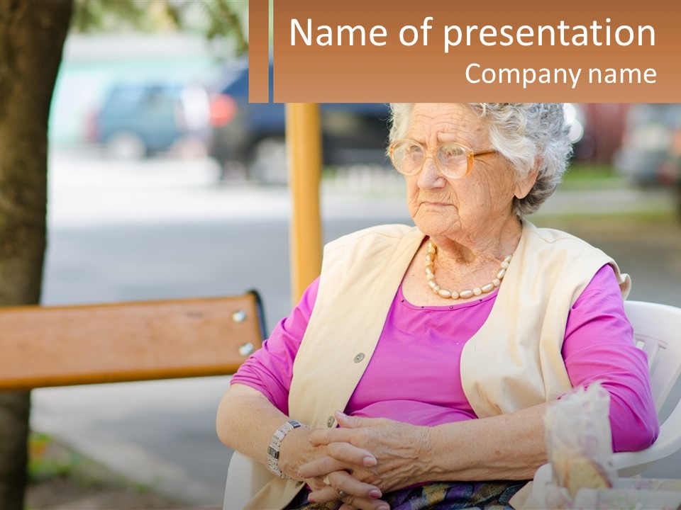 A Woman Sitting On A Bench With Her Hands Folded PowerPoint Template