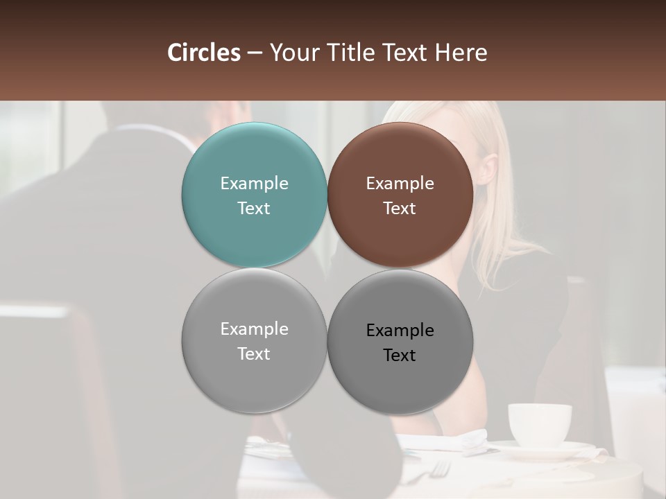 A Man And Woman Sitting At A Table Talking PowerPoint Template