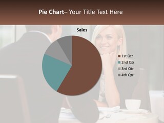 A Man And Woman Sitting At A Table Talking PowerPoint Template