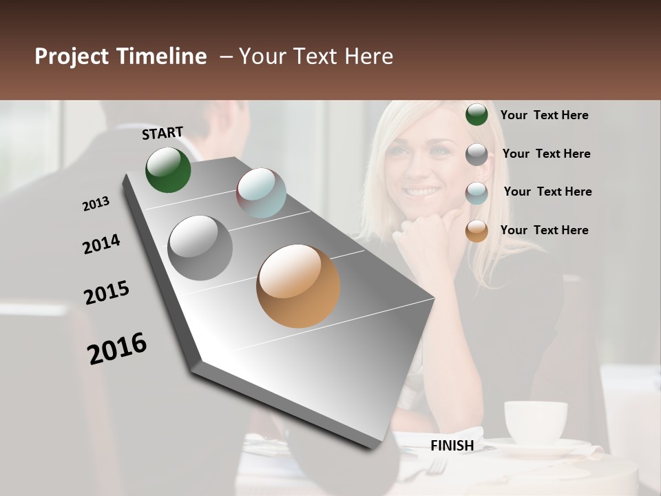 A Man And Woman Sitting At A Table Talking PowerPoint Template