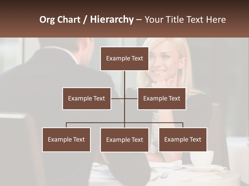 A Man And Woman Sitting At A Table Talking PowerPoint Template