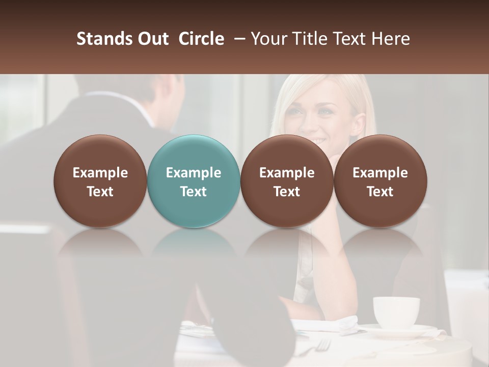 A Man And Woman Sitting At A Table Talking PowerPoint Template