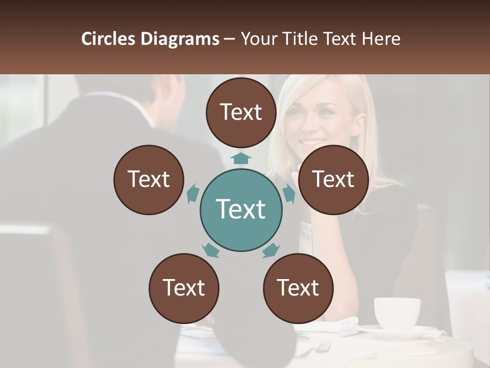 A Man And Woman Sitting At A Table Talking PowerPoint Template