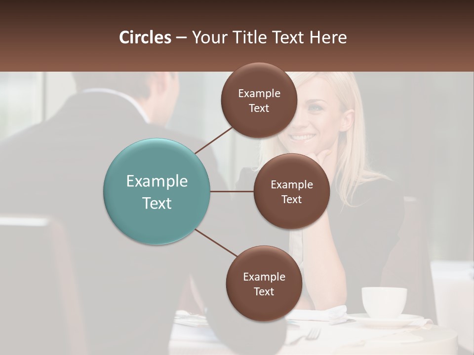 A Man And Woman Sitting At A Table Talking PowerPoint Template