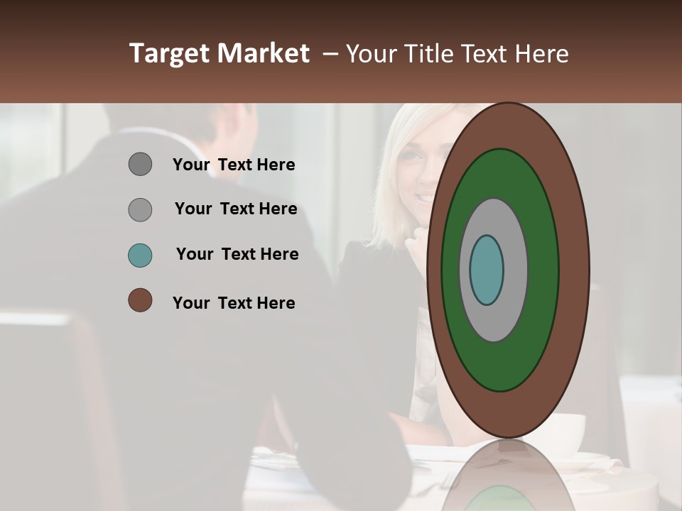 A Man And Woman Sitting At A Table Talking PowerPoint Template