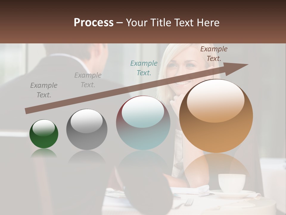 A Man And Woman Sitting At A Table Talking PowerPoint Template
