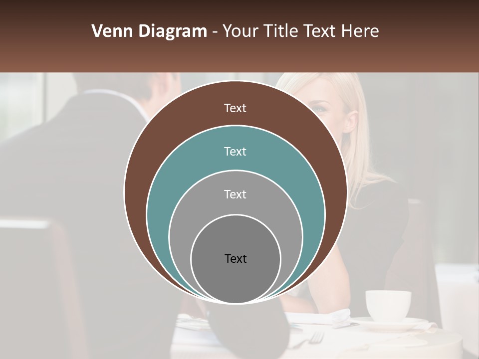 A Man And Woman Sitting At A Table Talking PowerPoint Template
