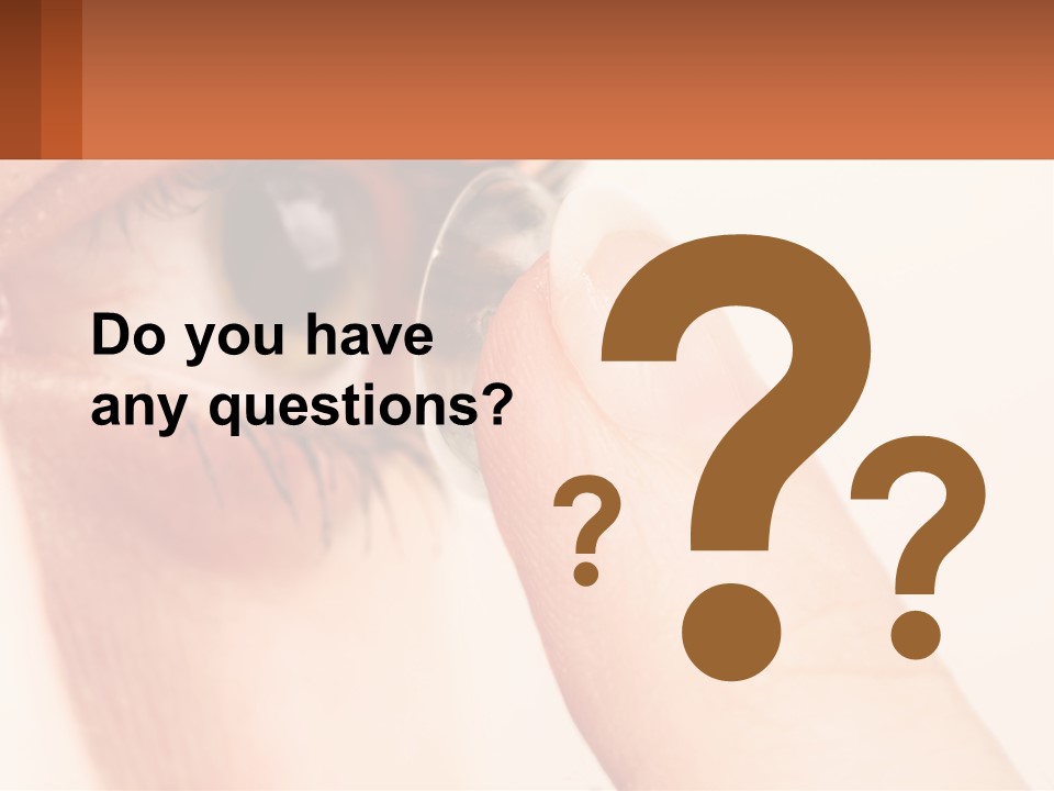 A Person Holding A Contact Lens Up To Their Eye PowerPoint Template