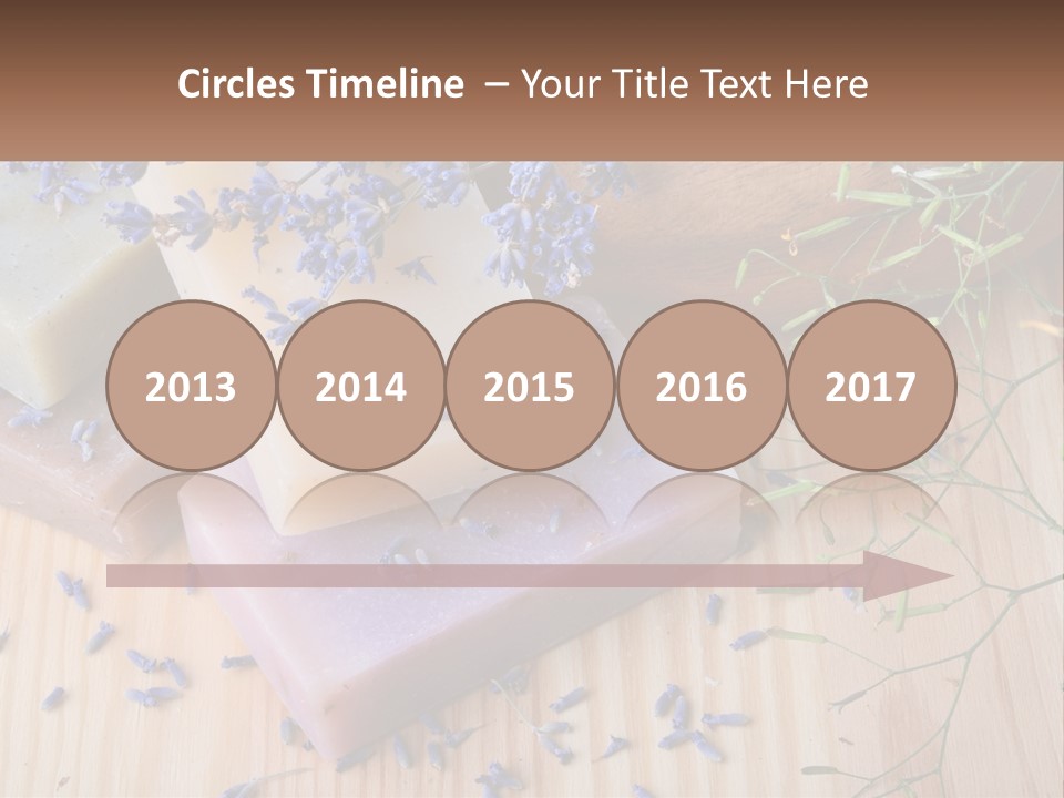 Soaps With Lavender Flowers On A Wooden Table PowerPoint Template