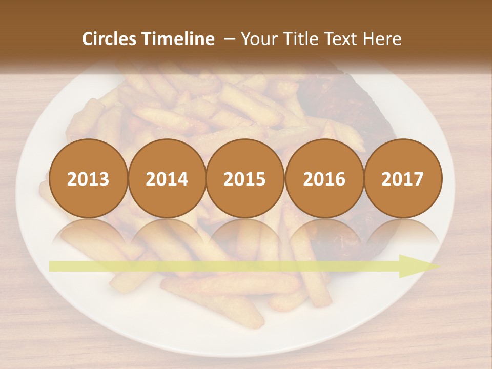 A Plate Of French Fries And A Hot Dog On A Plate PowerPoint Template