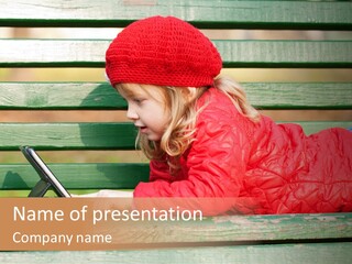 A Little Girl Sitting On A Bench Using A Tablet Computer PowerPoint Template