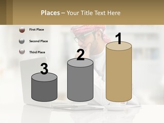 A Man Sitting In Front Of A Laptop Computer PowerPoint Template