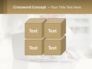 A Man Sitting In Front Of A Laptop Computer PowerPoint Template