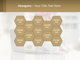 A Man Sitting In Front Of A Laptop Computer PowerPoint Template