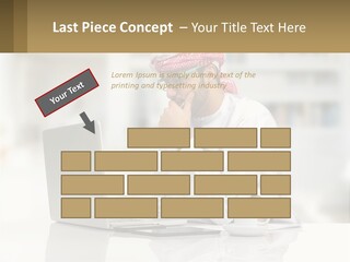 A Man Sitting In Front Of A Laptop Computer PowerPoint Template