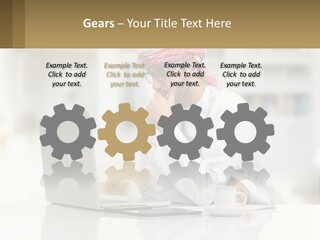 A Man Sitting In Front Of A Laptop Computer PowerPoint Template