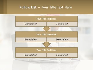 A Man Sitting In Front Of A Laptop Computer PowerPoint Template