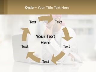 A Man Sitting In Front Of A Laptop Computer PowerPoint Template