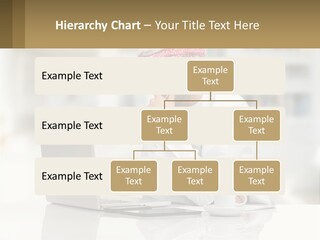 A Man Sitting In Front Of A Laptop Computer PowerPoint Template