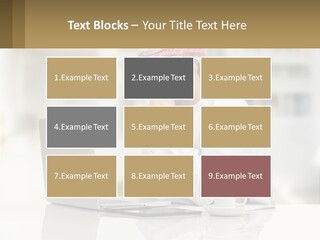 A Man Sitting In Front Of A Laptop Computer PowerPoint Template