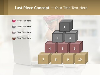 A Man Sitting In Front Of A Laptop Computer PowerPoint Template