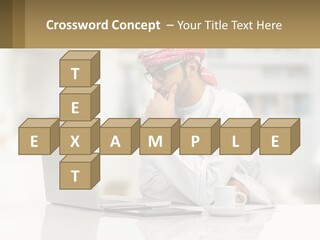 A Man Sitting In Front Of A Laptop Computer PowerPoint Template