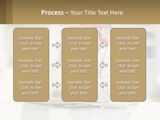 A Man Sitting In Front Of A Laptop Computer PowerPoint Template