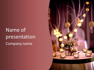 A Table Topped With Candles And A Vase Filled With Flowers PowerPoint Template