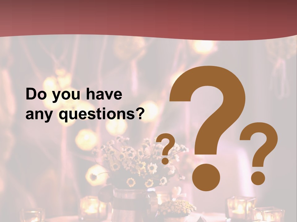 A Table Topped With Candles And A Vase Filled With Flowers PowerPoint Template