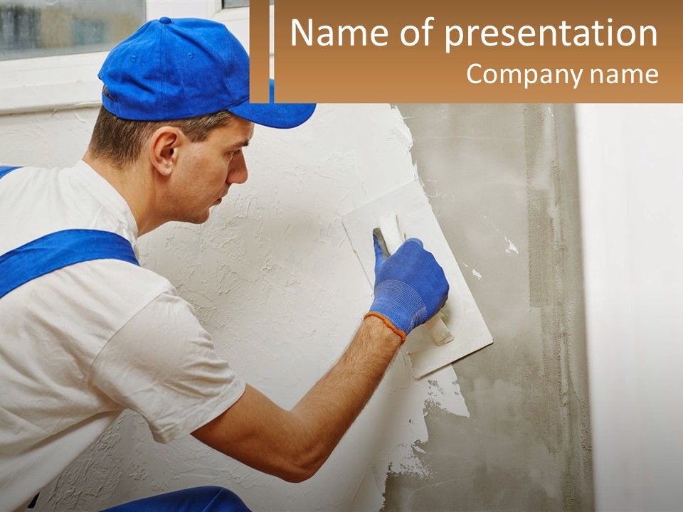 A Man In A Blue Hat And Blue Gloves Painting A Wall PowerPoint Template
