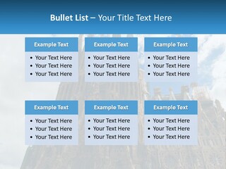 A Very Tall Building With A Sky Background PowerPoint Template