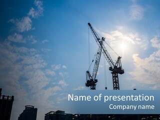 A Crane In The Sky With The Sun In The Background PowerPoint Template