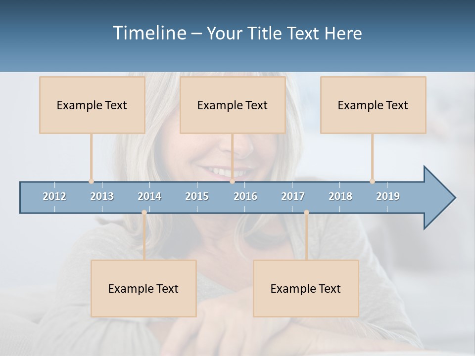 A Woman Sitting On A Couch Smiling For The Camera PowerPoint Template