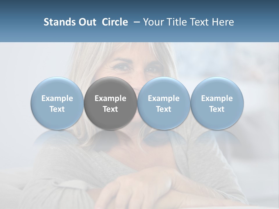 A Woman Sitting On A Couch Smiling For The Camera PowerPoint Template