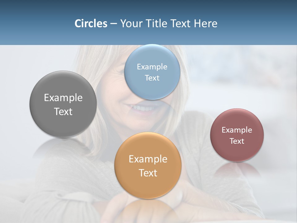 A Woman Sitting On A Couch Smiling For The Camera PowerPoint Template