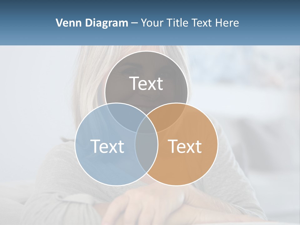 A Woman Sitting On A Couch Smiling For The Camera PowerPoint Template