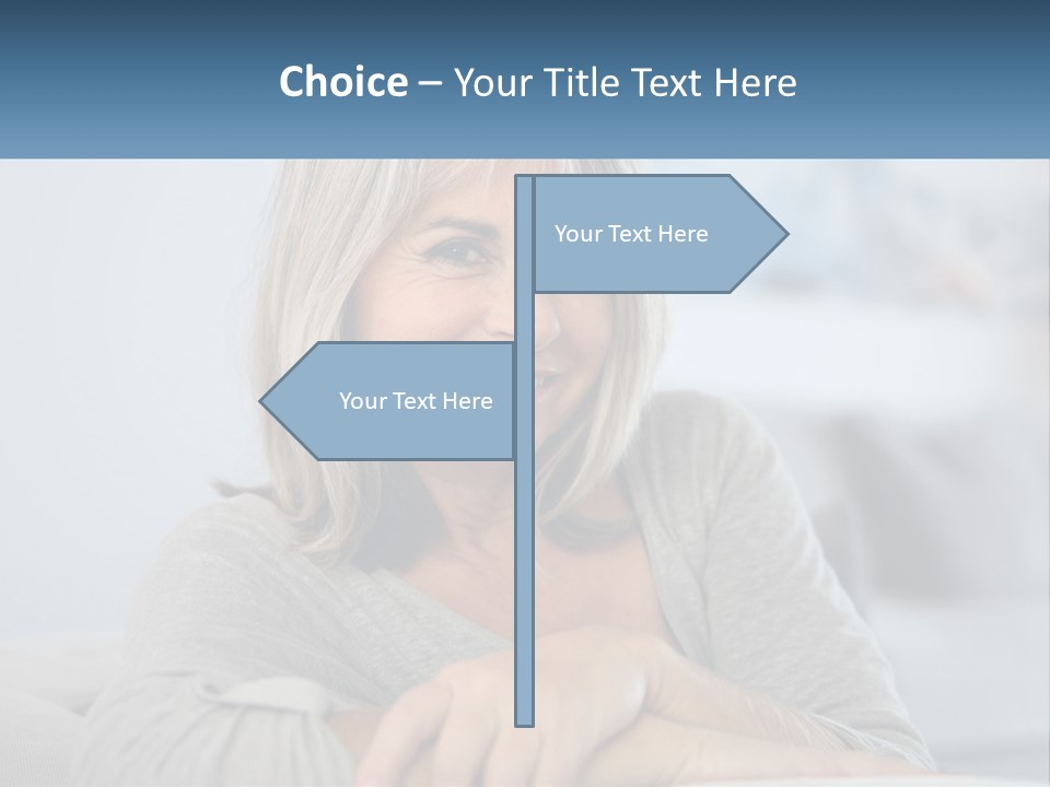 A Woman Sitting On A Couch Smiling For The Camera PowerPoint Template