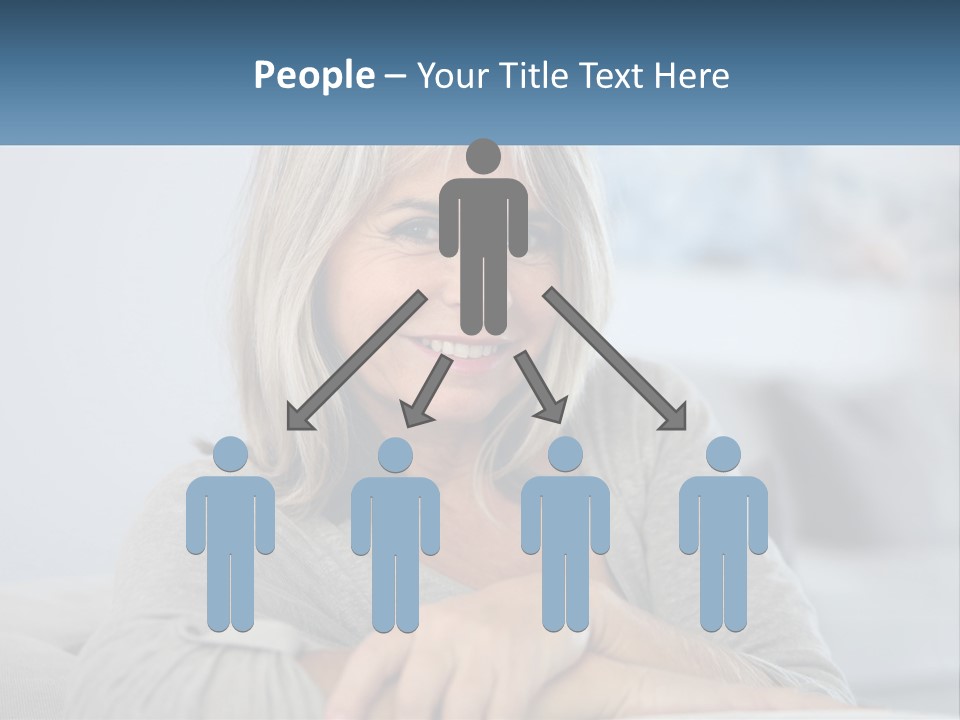 A Woman Sitting On A Couch Smiling For The Camera PowerPoint Template