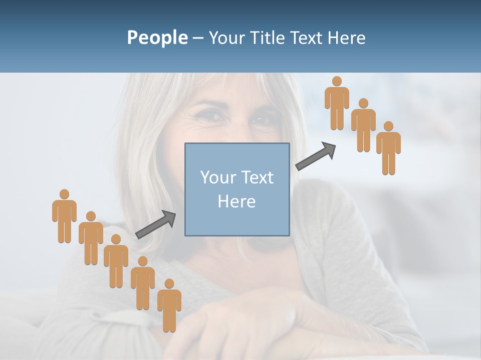 A Woman Sitting On A Couch Smiling For The Camera PowerPoint Template