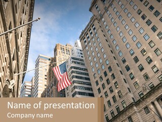 A City Street With Tall Buildings And An American Flag PowerPoint Template