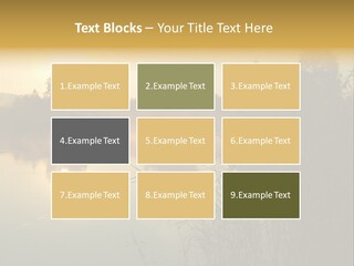 The Sun Is Setting Over A Lake With Reeds In The Foreground PowerPoint Template