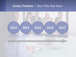 A Woman Looking At A Computer Screen With A Group Of People On It PowerPoint Template