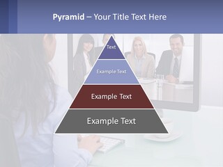 A Woman Looking At A Computer Screen With A Group Of People On It PowerPoint Template