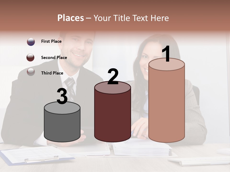 A Man And A Woman Sitting At A Desk PowerPoint Template