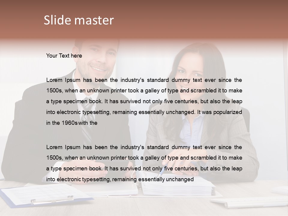 A Man And A Woman Sitting At A Desk PowerPoint Template